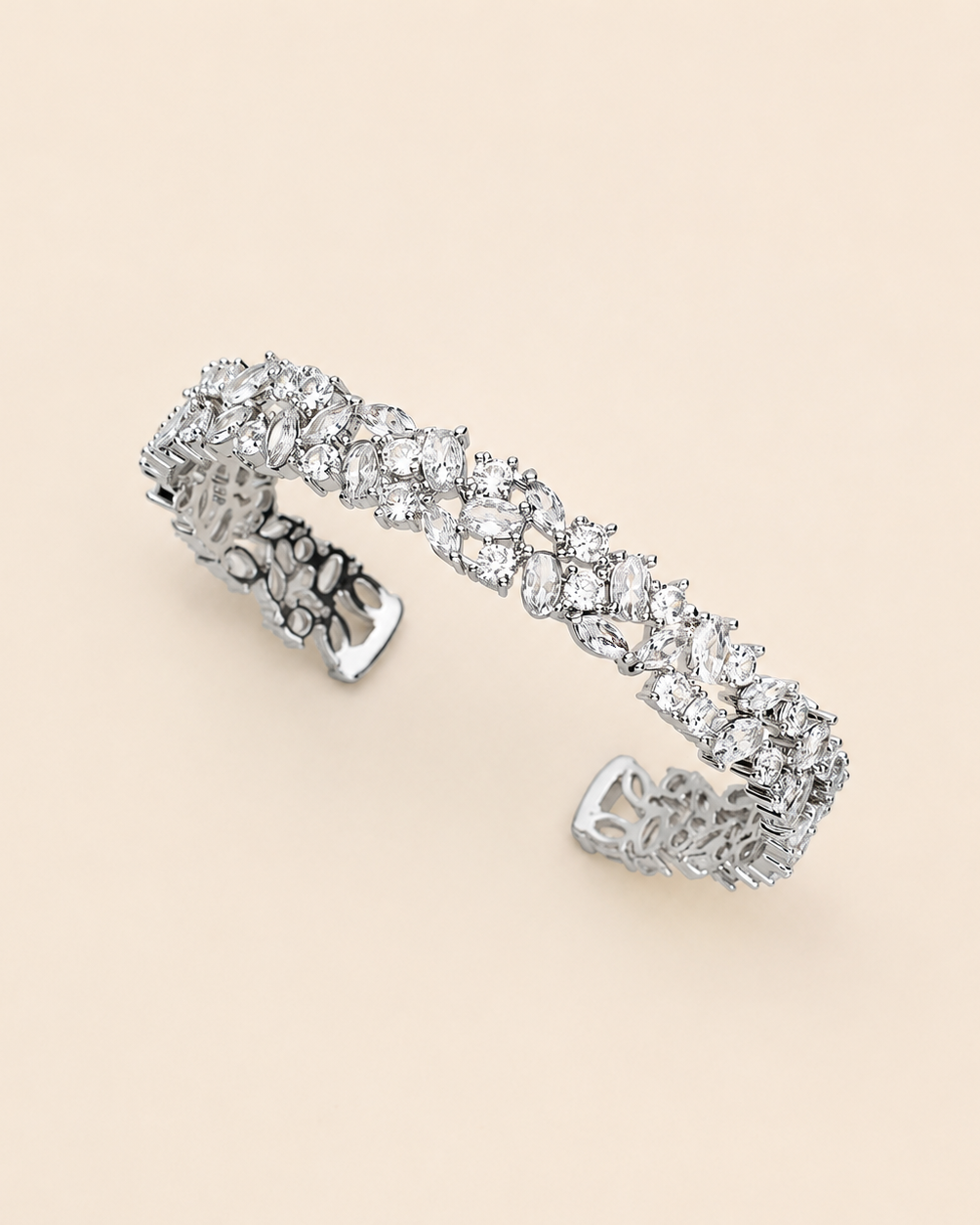 A silver bracelet adorned with numerous sparkling diamonds.
