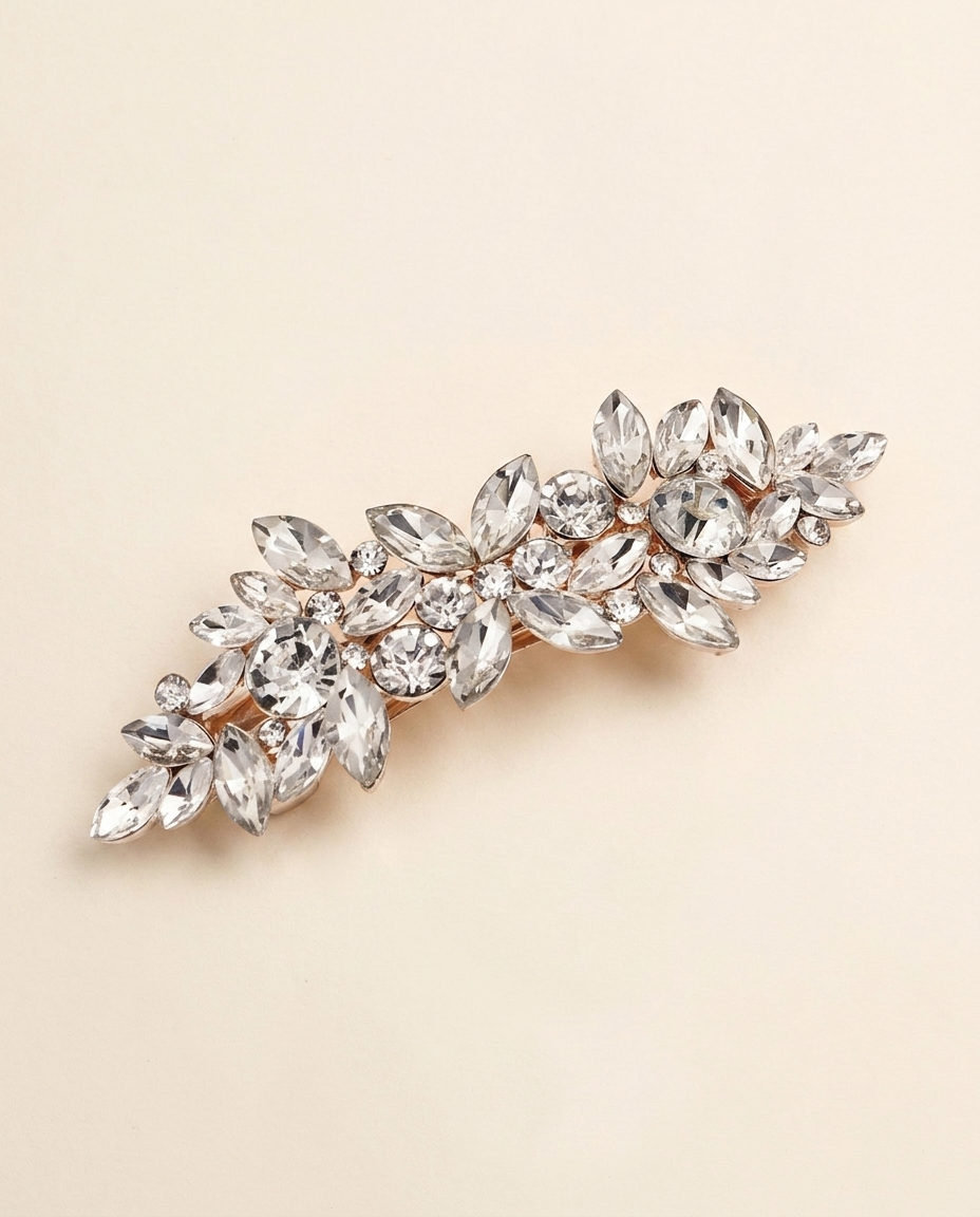 A decorative hair clip adorned with numerous sparkling crystal stones.