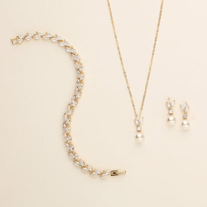 a necklace and earring set with pearls