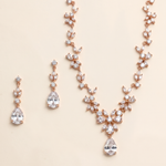 a necklace and earrings set with a delicate and elegant design.