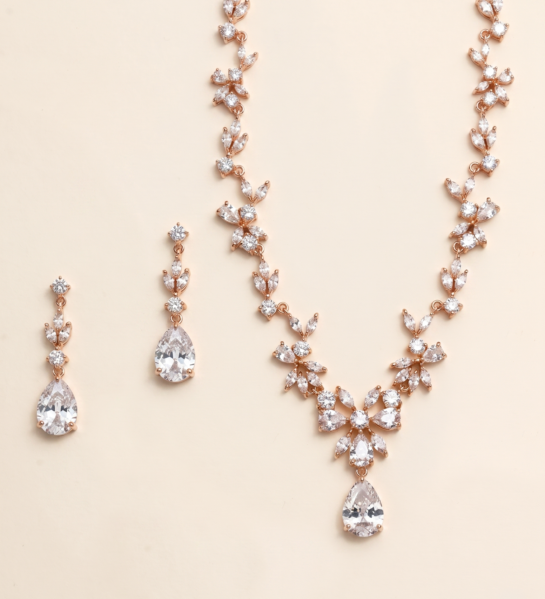 a necklace and earrings set with a delicate and elegant design.