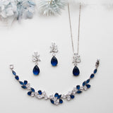 a necklace and earring set with blue stones