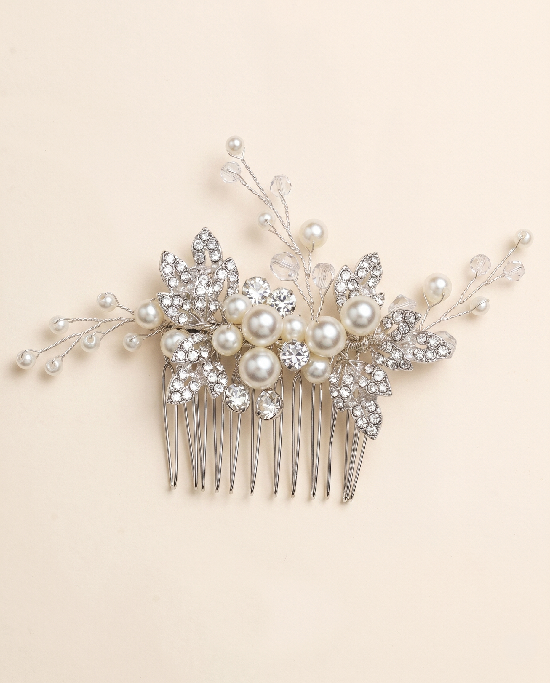 A decorative hair accessory with a floral design and sparkling crystal elements.