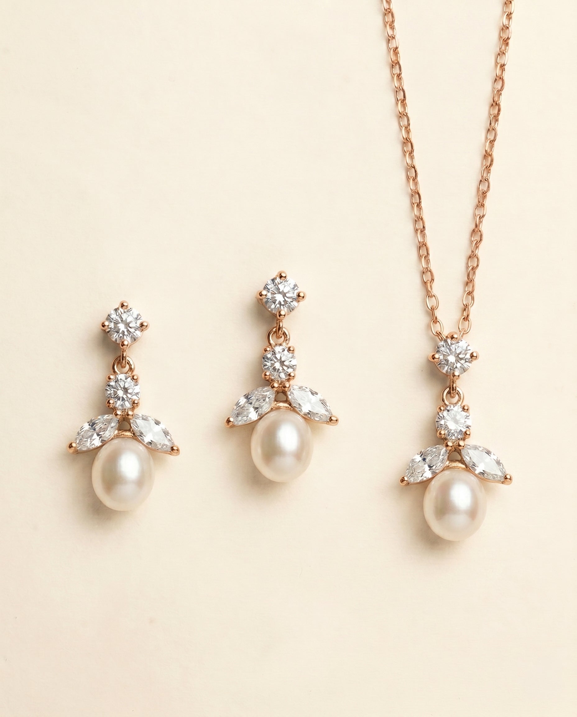 A necklace and earrings set with a delicate and elegant design.