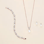 a set of jewelry including a necklace and earrings