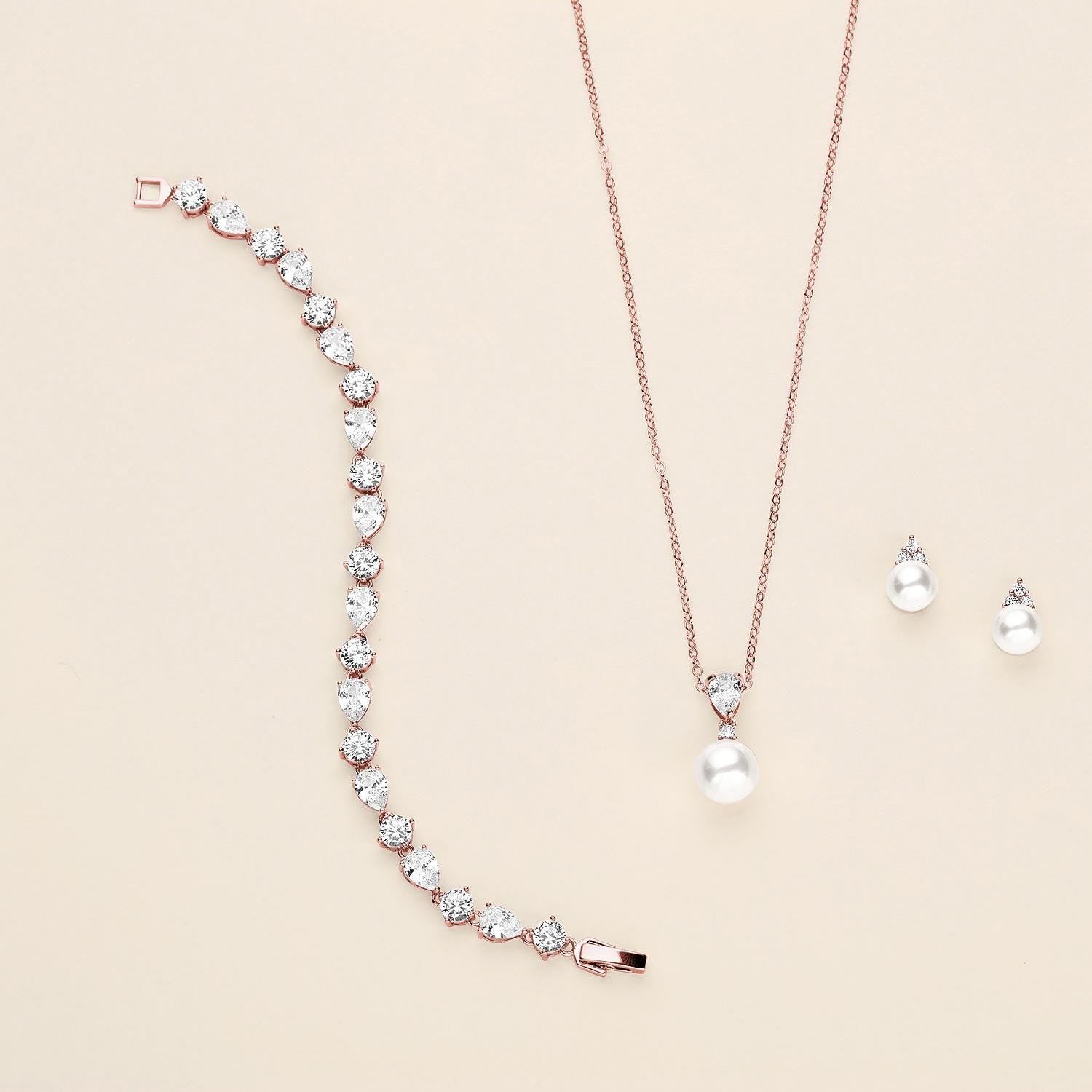 a set of jewelry including a necklace and earrings
