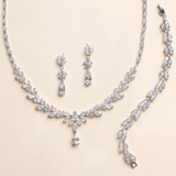 a necklace and earrings set made of sparkling diamonds.