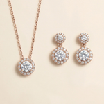 a necklace and earrings set with a delicate and elegant design.