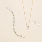 a set of jewelry including a necklace and earrings