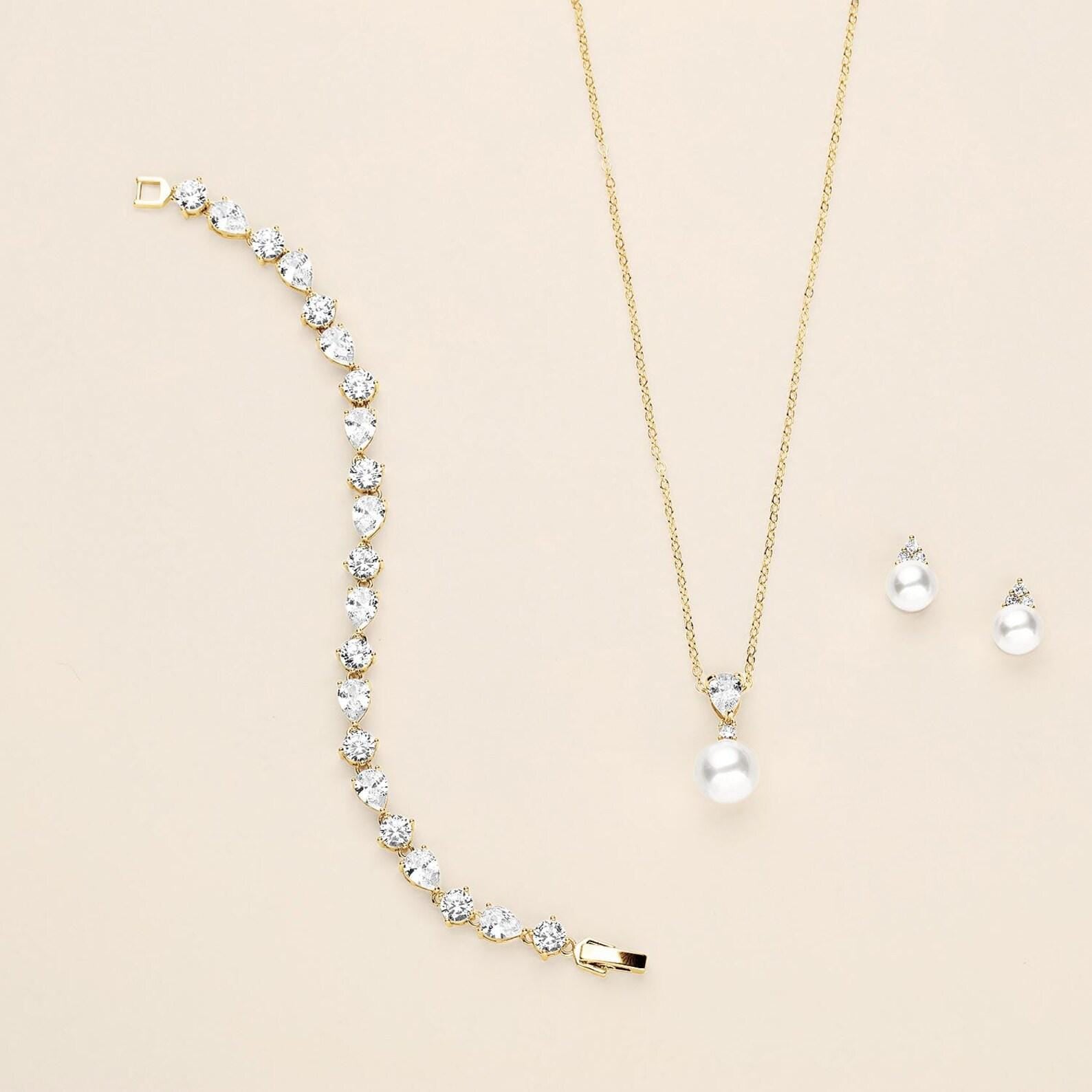 a set of jewelry including a necklace and earrings