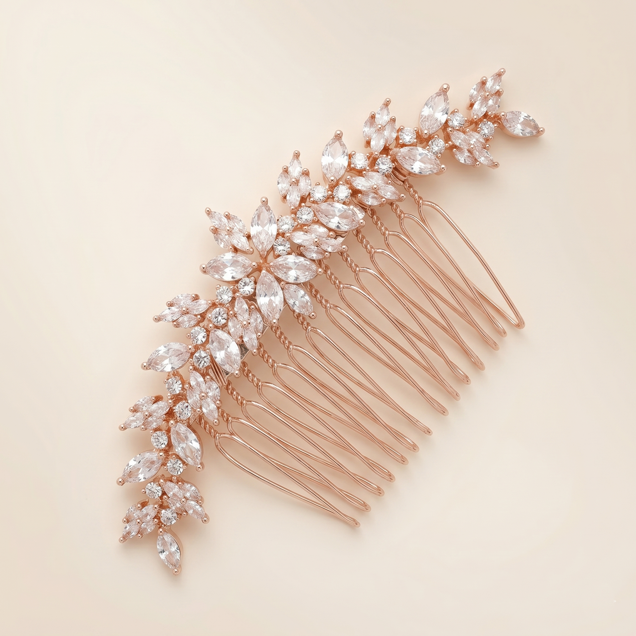 A decorative hair accessory with a floral design and small, clear gemstones.
