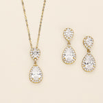 a set of jewelry including a necklace and earrings