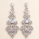 A pair of elegant diamond earrings with intricate designs and sparkling crystal elements.