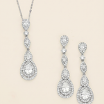 A necklace and earrings set made of sparkling diamonds.