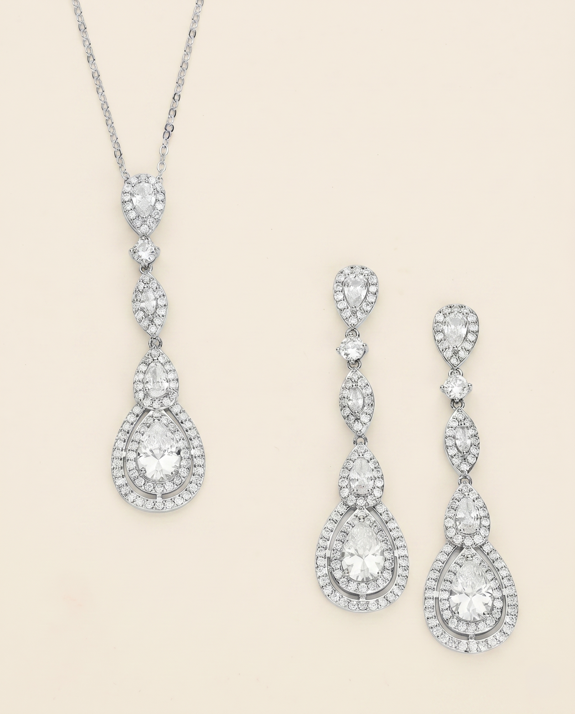 A necklace and earrings set made of sparkling diamonds.