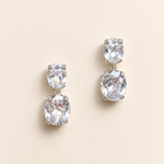 Josephine silver-finish drop earrings with clear faceted cushion-shaped accents and double-prong detail