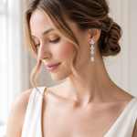 Melody silver long dangle wedding earrings worn with a bridal updo