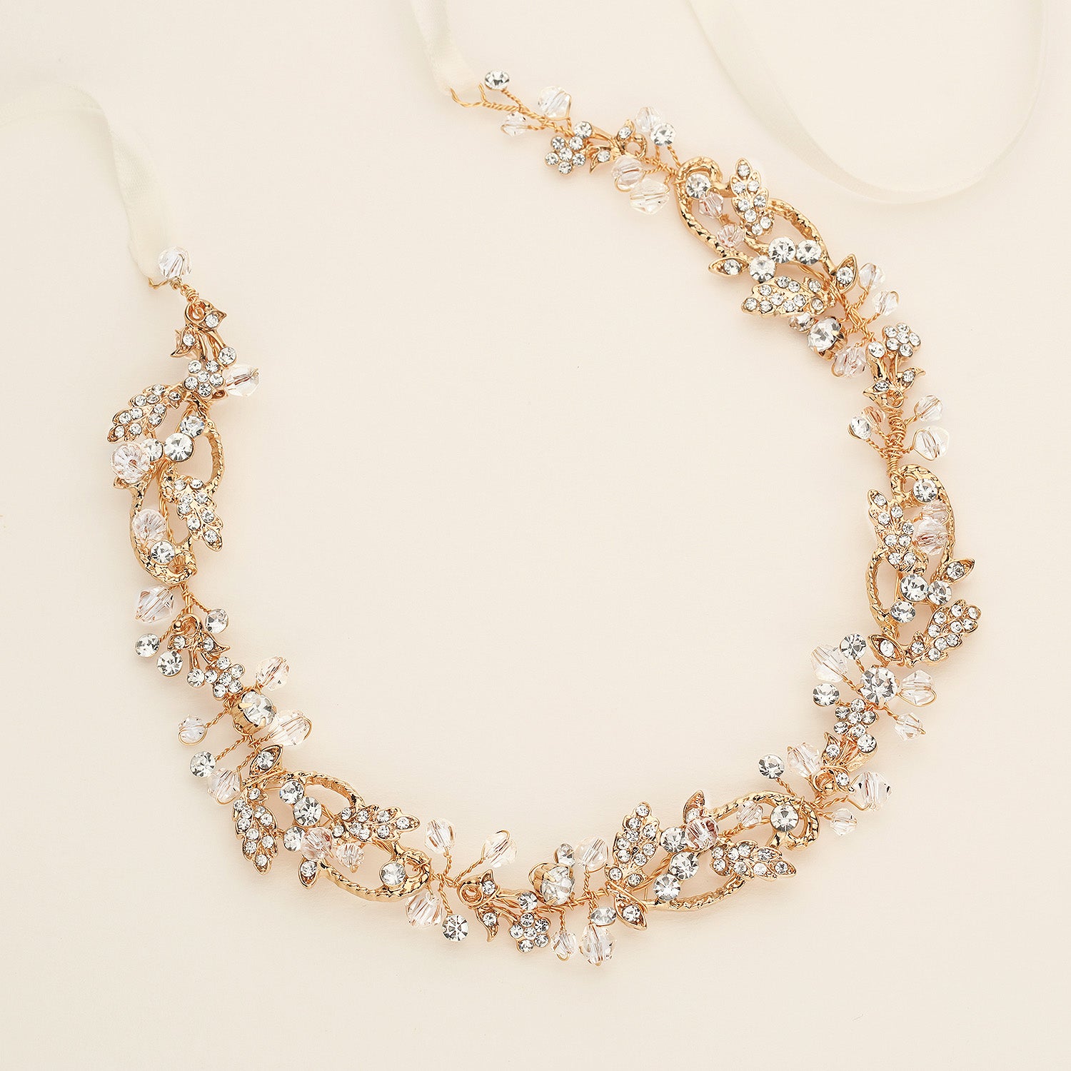 a bridal necklace with crystal stones and pearls