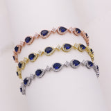 Kensley Sapphire Blue Gold Earrings and Necklace Set